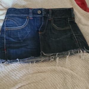 Never been worn, dark blue denim skirt